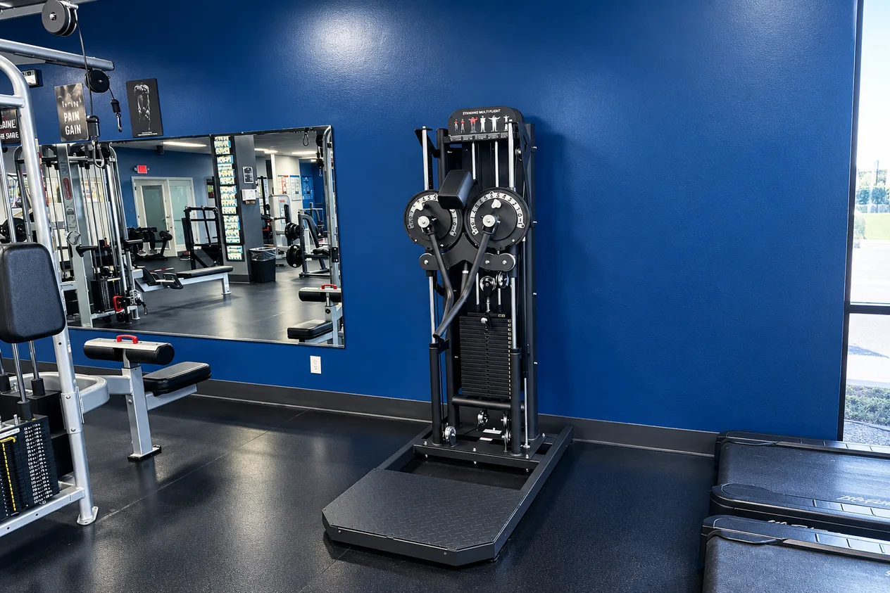 Row of cable machines and functional trainers